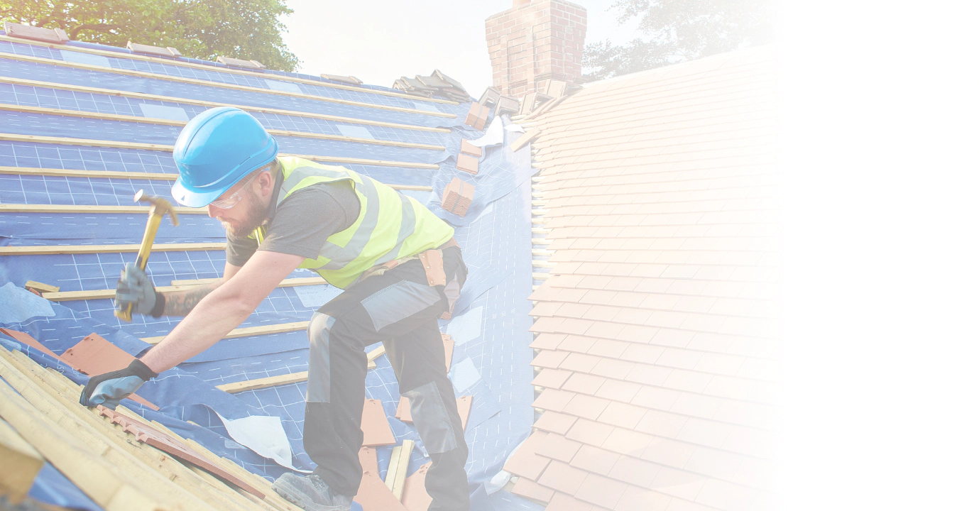 roofer replacing roof tiles
